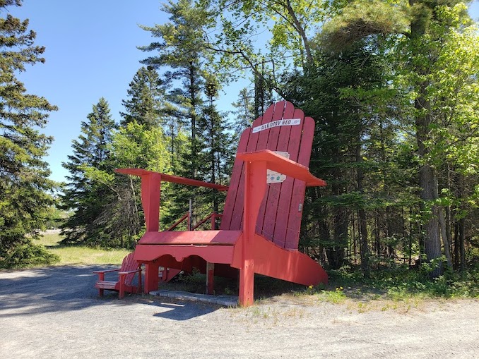 Who doesn’t love a giant Muskoka chair? There are a few of these sprinkled across Ontario. Here’s one we found on our way into Sault Ste. Marie. You can see a standard sized muskoka chair to the left for comparison. 