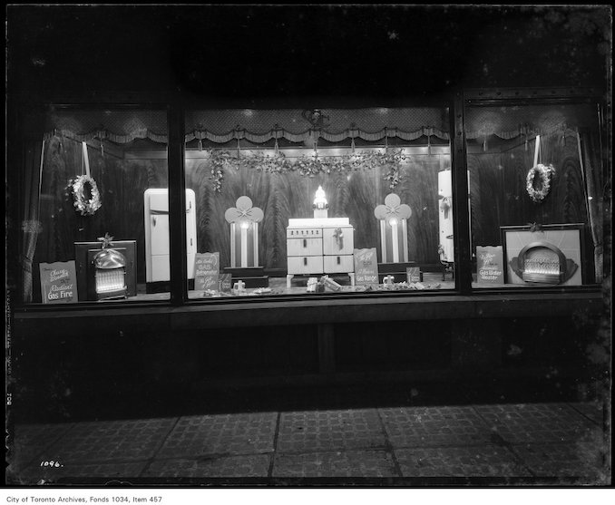 1935-Christmas window display 55 Adelaide Street East various gas appliances Gas refrigeratorthe gift of gifts
