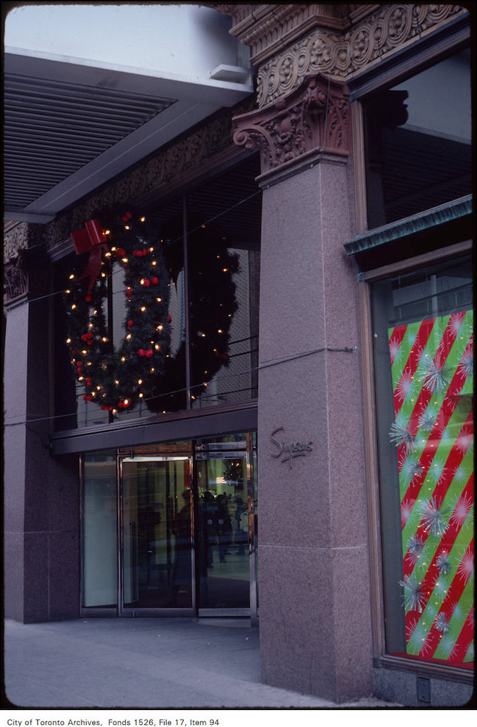 1981-View of Christmas decorated entrance to Simpsons Queen Street West side