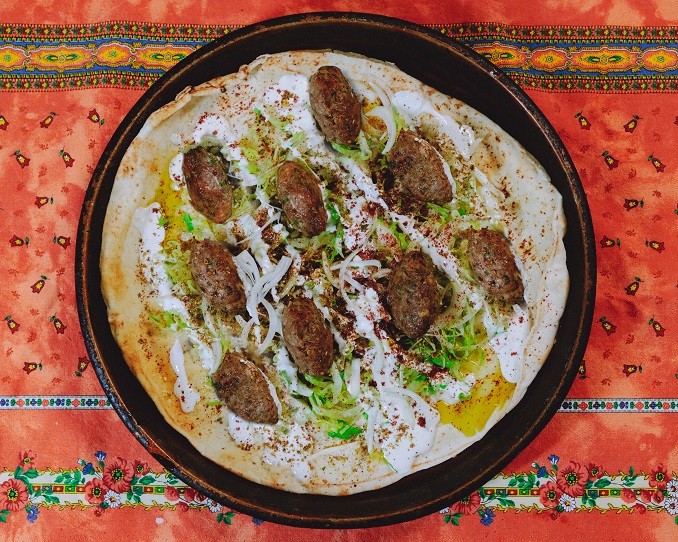 Turkey Meatballs Served in Pita Topped With Yogurt Sauce and Shredded Romaine by Chef Chuck Hughes