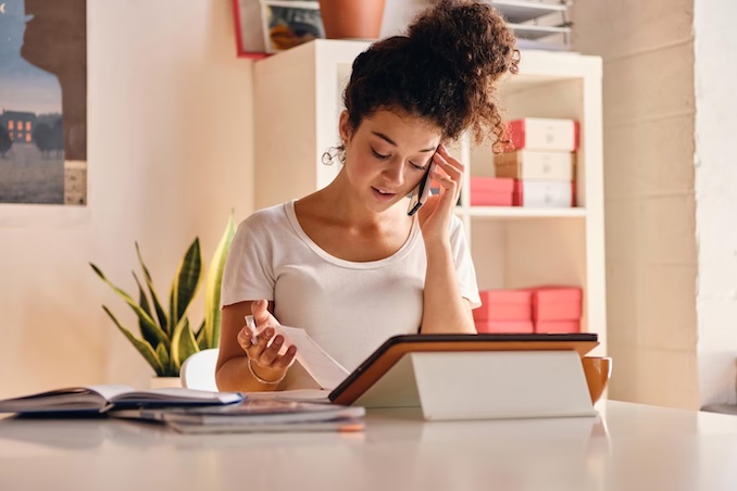 women at desk image