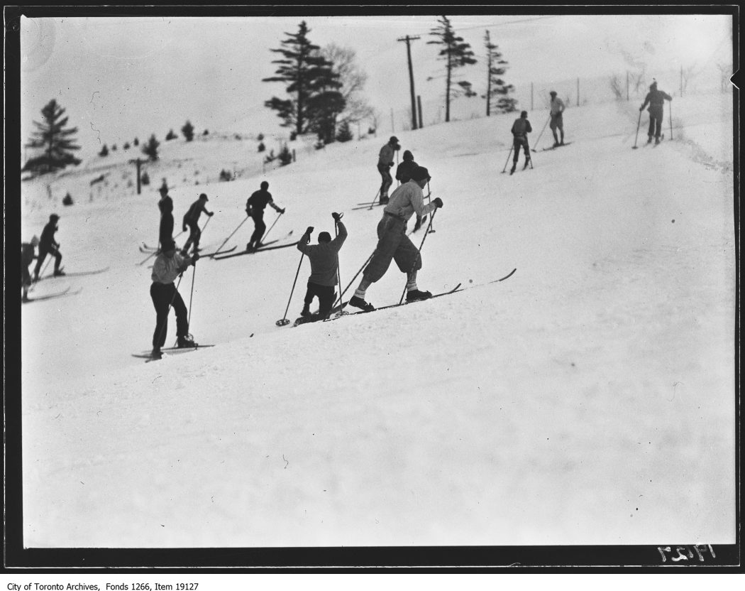 1930 - Toronto Ski Club, skiers going uphill