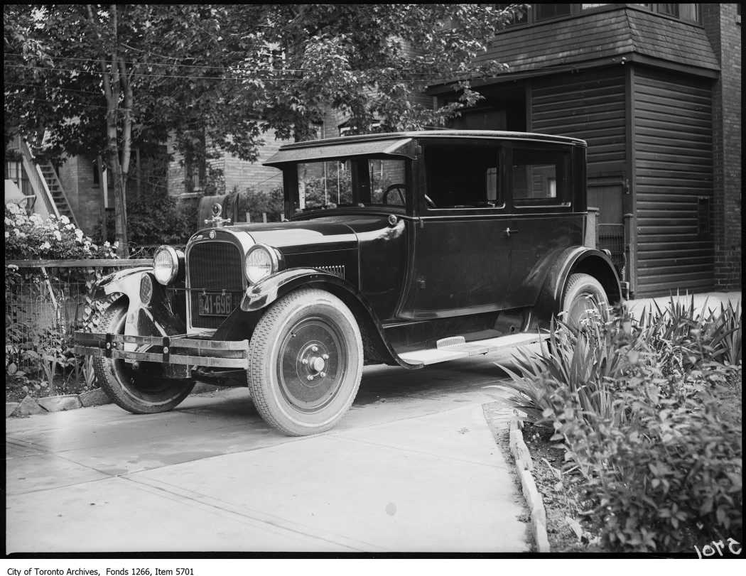 1925 - New Dodge car in yard