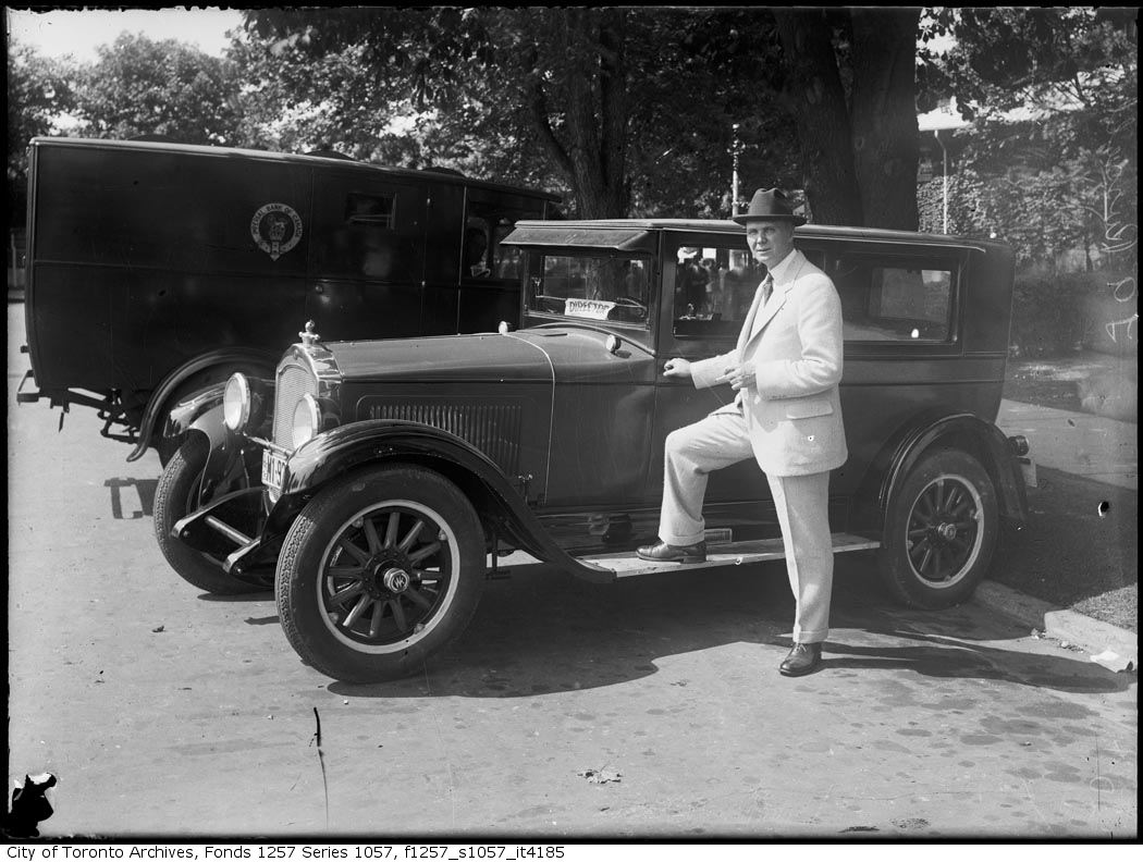 1926 - C.A. Russell with car and Imperial Bank of Commerce van