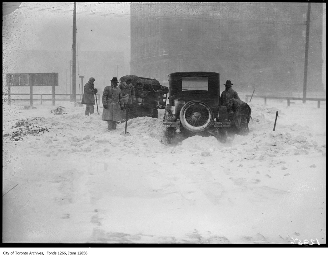 1928 - Storm photos, car and truck in drift, [near] Terminal Warehouse