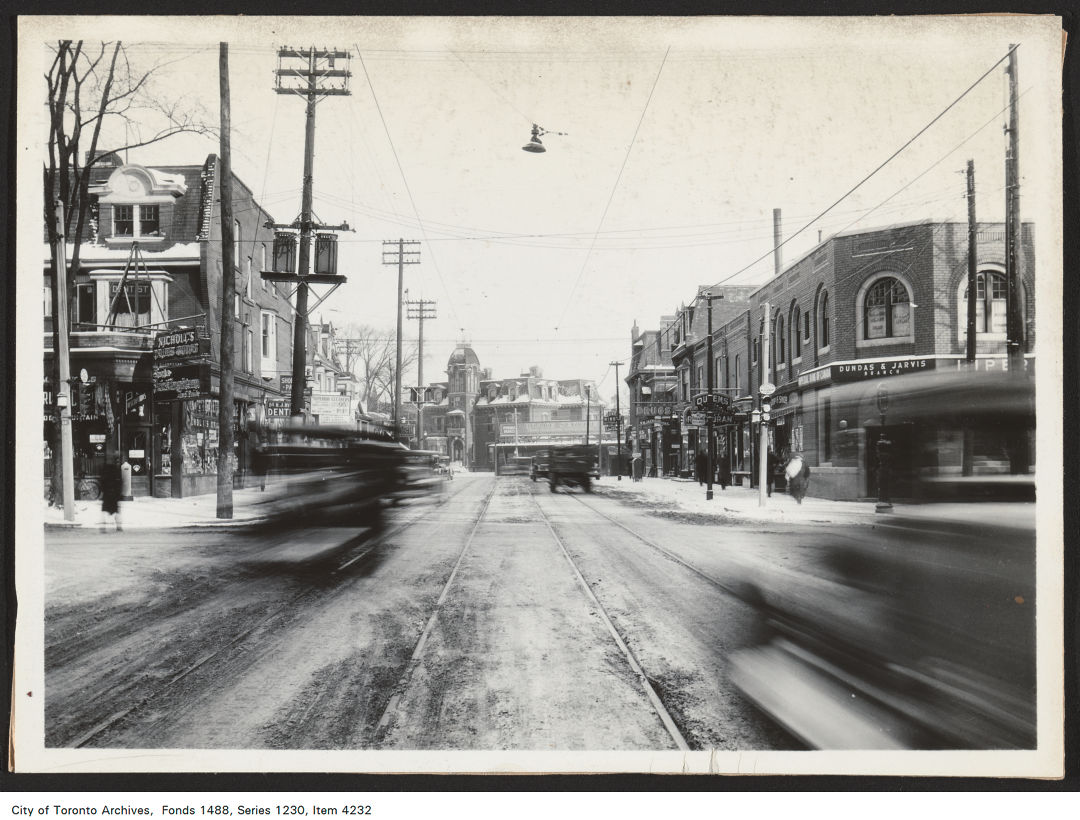 1930 - 1935 - photograph of signage at a service station, Dundas Street East, east of Jarvis Street.