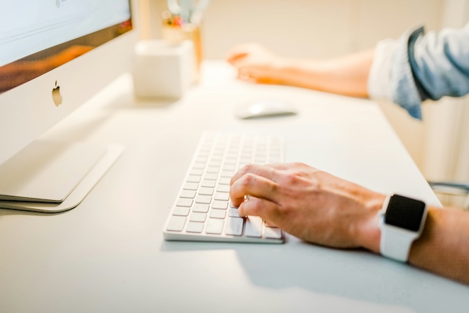 computer user on keyboard