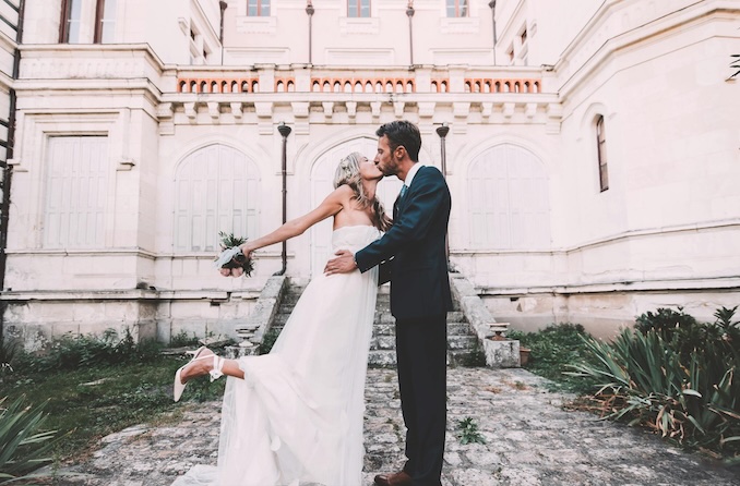 Couple getting married in their suit and wedding dress