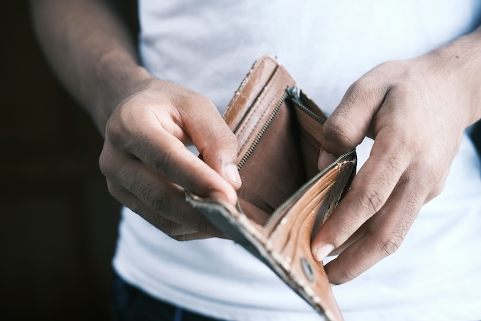 man opening wallet