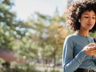 featured image of woman using a cellphone