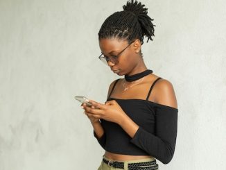 Woman using her cell phone for featured image