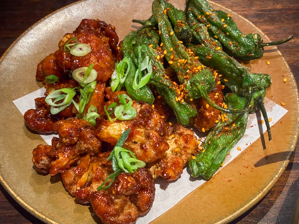 Korean Fried Cauliflower - a dish that has been a menu staple since day one, handed down from chef to chef) and shishito peppers