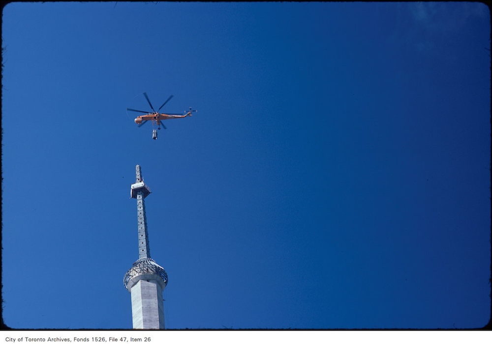 CN Tower Construction with Helicopter attaching antenna portion